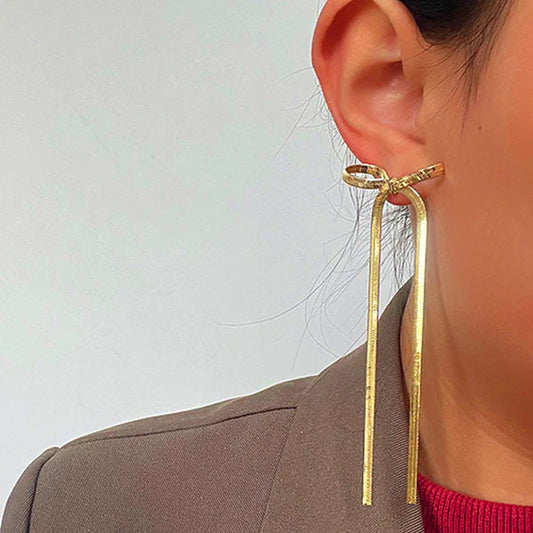 Tied & True – Gold Bow Drop Studs